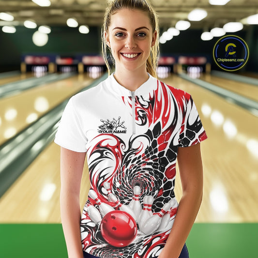 Front view of a female model wearing a white bowling quarter-zip shirt with red and black tribal patterns and bowling pin artwork