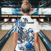 Load image into Gallery viewer, Back view of a female model in a white bowling quarter-zip shirt featuring blue and black tribal graphics and textured scale-inspired details