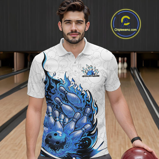 Male model at the bowling lane wearing a white and blue bowling polo decorated with fiery bowling action graphics.