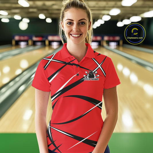 Front view of a female bowler in a bowling alley wearing a red, black, and white bowling polo shirt with an athletic jersey pattern