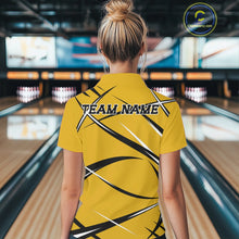 Load image into Gallery viewer, Back view of a female bowler wearing a yellow, black, and white bowling polo shirt in a bowling lane setting