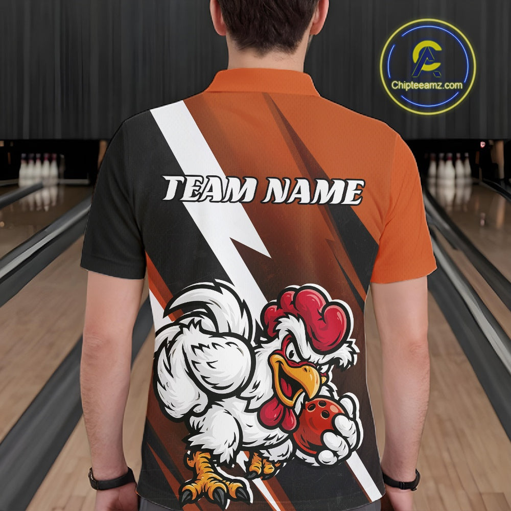 A man viewed from behind wearing a custom short-sleeve bowling shirt with a black and orange color-blocked design, a white lightning bolt, and a cartoon rooster mascot holding a bowling ball. The background shows bowling lanes.