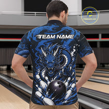 Load image into Gallery viewer, Man wearing a blue dragon-themed bowling shirt with 'Team Name' text at a bowling alley.