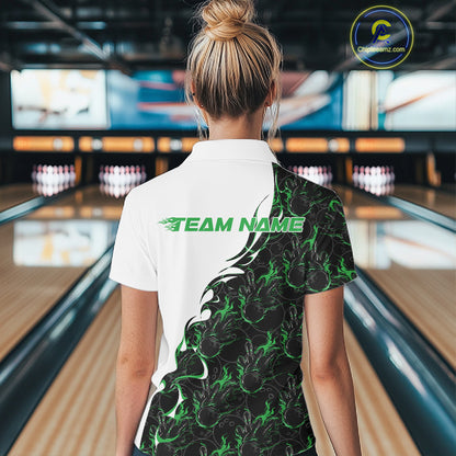 Back view of a female model in a bowling lane wearing a white quarter-zip shirt, showcasing green and black flame bowling pattern with bold athletic bowling graphics.
