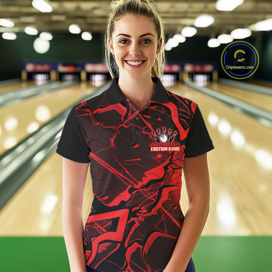 Female model wearing a black and red bowling polo at the bowling lane with sharp geometric graphics.
