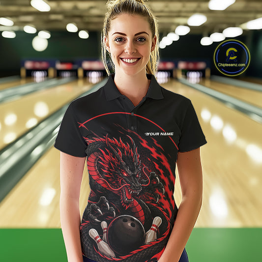Front view of a female model in a bowling alley wearing a red custom bowling polo shirt featuring an aggressive dragon with flames in a dynamic and energetic design.