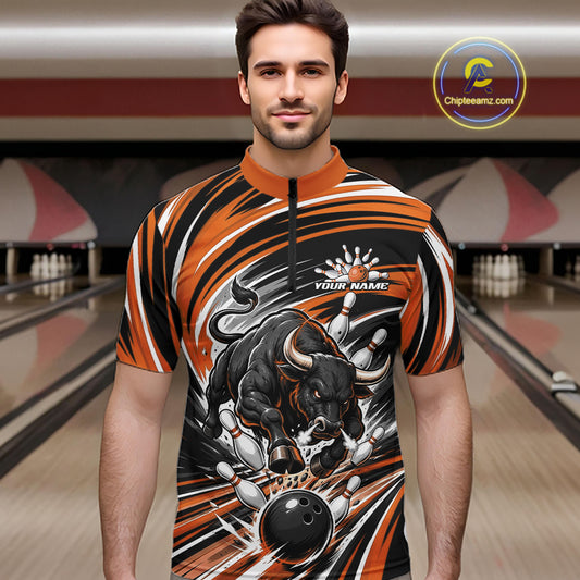 A man wearing a short-sleeve bowling jersey with a bold graphic design of a charging bull and bowling pins, set against a blurred bowling alley background. 