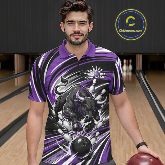 A man wearing a purple and black bowling-themed graphic polo shirt with a bull and bowling ball design, standing in a bowling alley holding a bowling ball. 