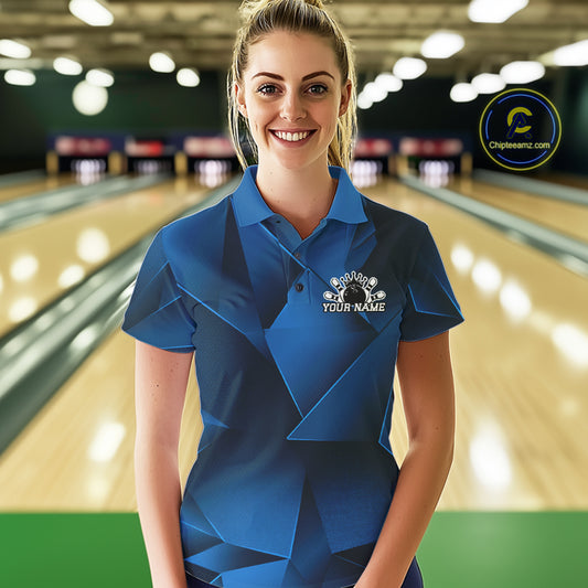 Woman wearing a blue bowling shirt with a logo in a bowling alley