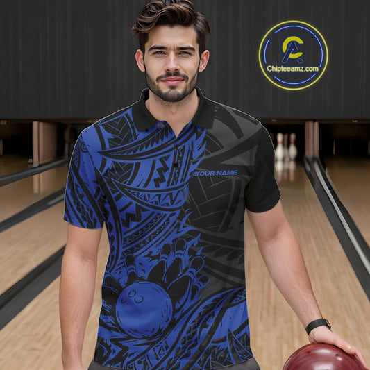 Man wearing a black and blue bowling shirt with a bowling ball design, standing on a bowling lane.