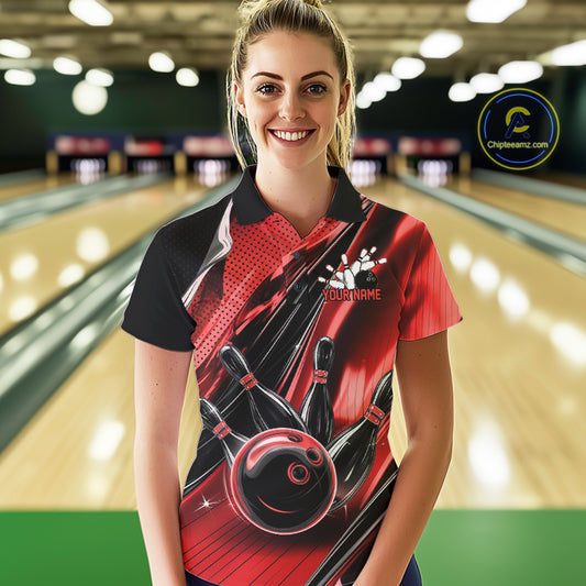 Female model wearing a black and red bowling polo shirt at the bowling lane with energetic bowling ball and pin graphics.