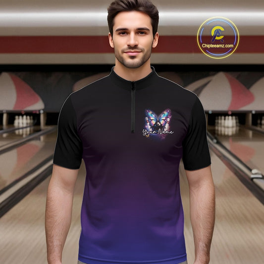 Male model wearing a colorful bowling quarter-zip shirt at a bowling lane with glowing butterflies, a bowling ball centerpiece, and cosmic artwork.