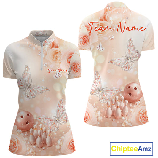 Front and back view of a women’s bowling quarter-zip shirt featuring pastel glitter butterflies above bowling pins and a bowling ball.