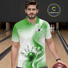 Load image into Gallery viewer, Male model inside a bowling center wearing a white and green bowling polo shirt with flowing wave artwork and a bowling ball knocking down pins