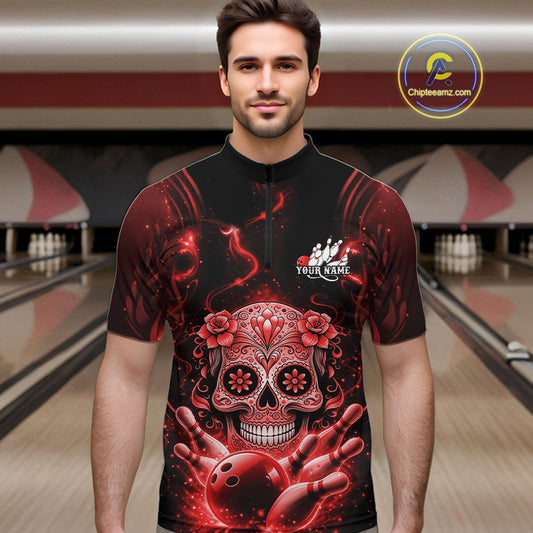 Male model wearing a black and red bowling quarter-zip shirt at a bowling lane with Day of the Dead-inspired sugar skull and bowling graphics.