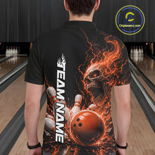Load image into Gallery viewer, Back view of a male model in a bowling alley wearing a black bowling polo with an orange flaming skull, lightning, bowling pins, and a custom name.
