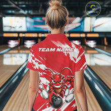 Load image into Gallery viewer, Back view of a female model in a bowling alley wearing a red custom bowling polo shirt with an aggressive crawfish bowling design and a distressed background.