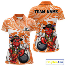 Load image into Gallery viewer, Front and back views of an orange custom women's bowling polo shirt featuring a funny Cajun crawfish leaning on a bowling ball with a swamp inspired texture background.