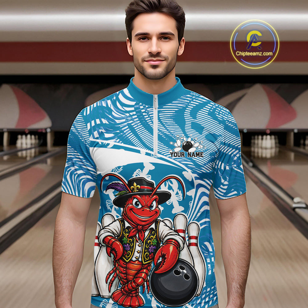 Front view of a male model in a bowling alley wearing a blue custom quarter-zip bowling shirt with a funny Cajun crawfish leaning on a bowling ball and a swamp-inspired texture background.