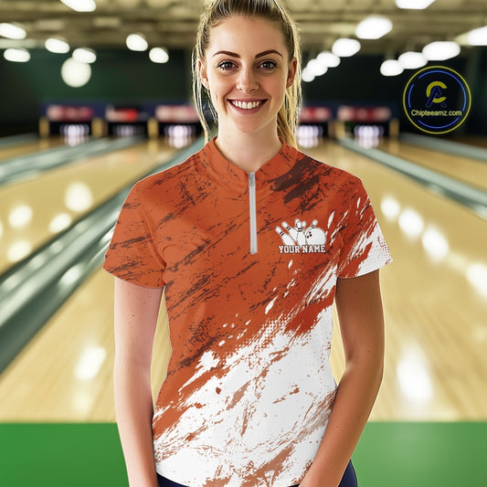 Woman wearing a custom bowling shirt with a bowling alley in the background