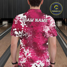 Load image into Gallery viewer, Person wearing a pink and white bowling shirt with 'TEAM NAME' on a bowling alley.