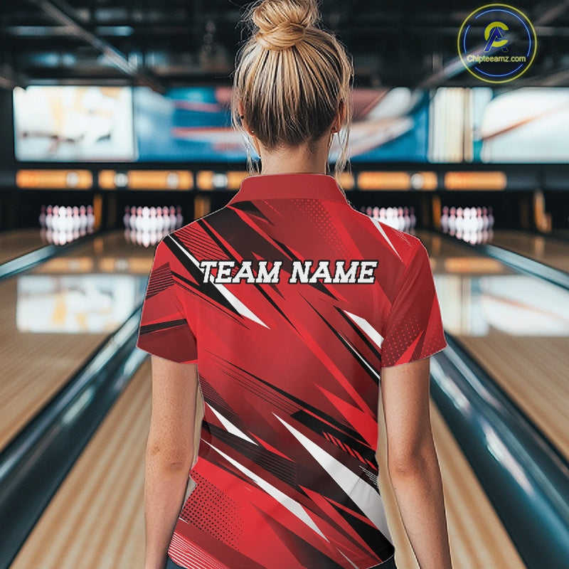 Person wearing a red bowling shirt with 'TEAM NAME' text in a bowling alley.