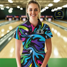Load image into Gallery viewer, Woman wearing a colorful bowling shirt with a blurred bowling alley in the background
