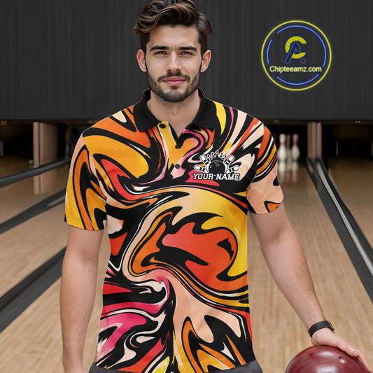 Man wearing a colorful bowling shirt with a pattern, holding a bowling ball on a bowling lane.