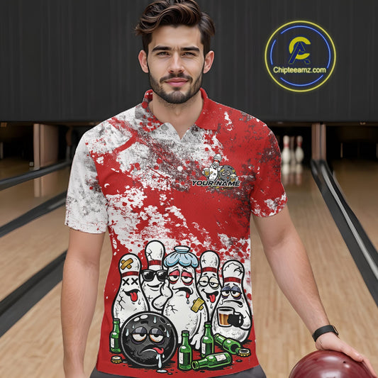 Front view of a male model in a bowling lane wearing a red and white grunge splatter polo shirt with humorous bowling pins and beer bottle scene.