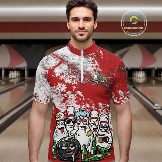 Male model in a bowling lane wearing a quarter zip shirt, front view featuring red and white grunge splatter background with cartoon bowling pins, bowling ball, and beer bottle themed artwork