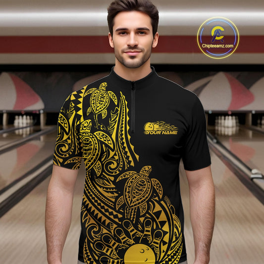 Male model wearing a black and gold bowling quarter-zip shirt at the lane with turtle Polynesian bowling graphics.