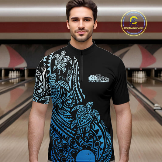Male model wearing a black and blue bowling quarter-zip shirt at the bowling lane with Polynesian-inspired bowling accents.