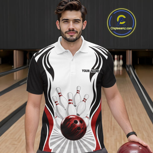 Front view of a male model wearing a white, black, and red bowling polo shirt with bowling ball hitting the pins artwork at a bowling lane.