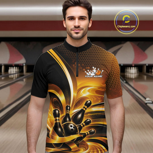 Male model at the bowling lane wearing a bowling quarter-zip shirt, front view, with glossy gold and black bowling ball and pins graphics.