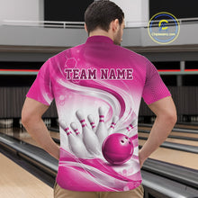 Load image into Gallery viewer, Male model standing in a bowling lane wearing a white and pink bowling quarter-zip shirt featuring abstract wave lines and a glossy bowling ball striking pins on the front.