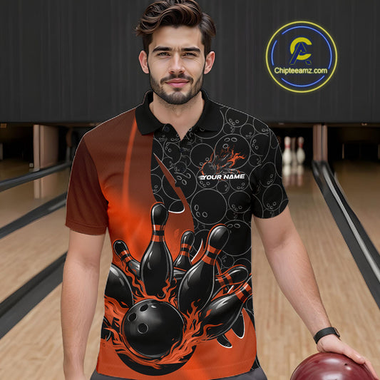 Front view of a male model in a bowling lane wearing a black and orange polo shirt with flaming black bowling ball striking pins and energetic sports visuals.