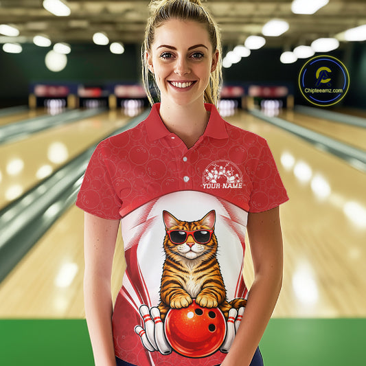 Female model wearing a bowling polo shirt at a bowling lane with a Bengal cat in sunglasses and bowling ball graphics.