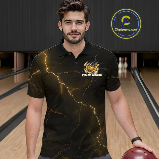 Male model wearing a black and yellow bowling polo with dragon claw artwork, flaming bowling ball, and lightning fantasy accents.