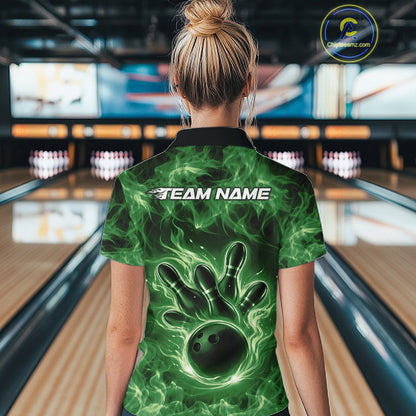 Back view of a green bowling quarter-zip displaying a fiery bowling ball graphic.