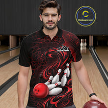 Load image into Gallery viewer, Male model wearing a black and red bowling polo shirt in a bowling alley featuring a tribal flame bowling ball and pins graphic