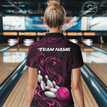 Load image into Gallery viewer, Back view of a female model wearing a black and pink bowling quarter-zip shirt in a bowling alley featuring a tribal flame bowling ball and pins graphic