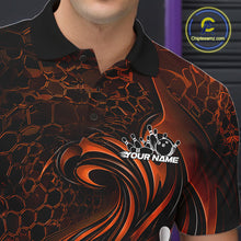 Load image into Gallery viewer, Close-up of the left chest on a black and orange bowling polo shirt featuring a tribal flame bowling ball and pins graphic
