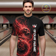 Load image into Gallery viewer, Male model wearing a black bowling quarter-zip shirt in a bowling alley with a skull holding a bowling ball amid swirling red energy flames