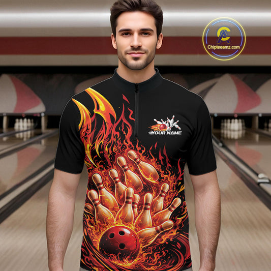 Male model in bowling lane wearing quarter-zip shirt with flaming bowling ball striking pins red blazing fire artwork