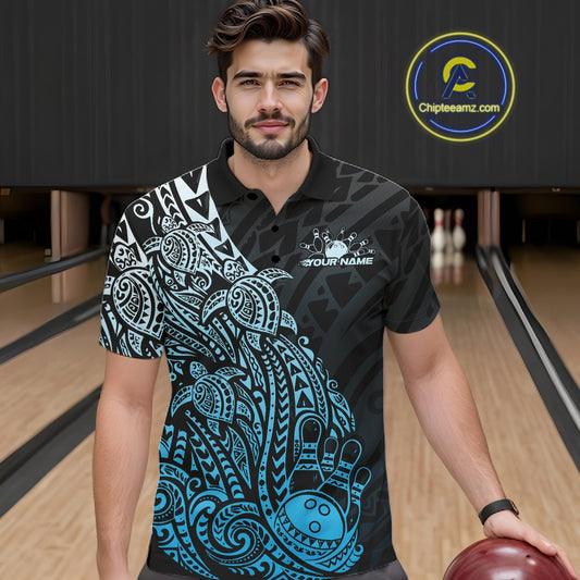 Male model wearing a black and blue bowling polo shirt at the lane with Polynesian-style bowling graphics.