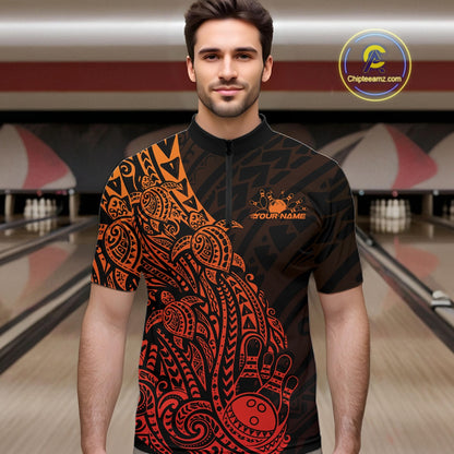 Male model wearing a black and red orange bowling quarter-zip shirt at the bowling lane with turtle-inspired Polynesian bowling graphics.