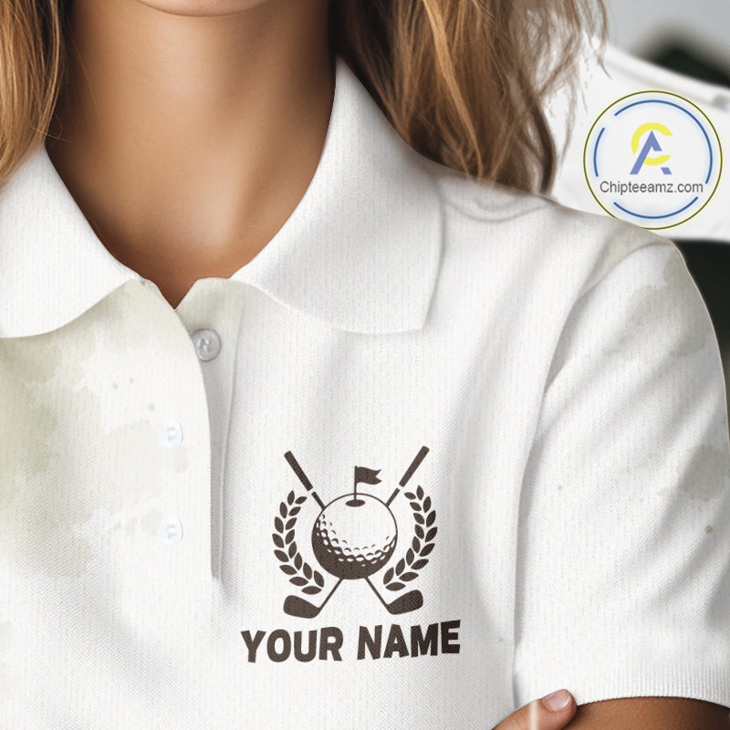 White polo shirt with golf-themed design and 'Your Name' text on a blurred background