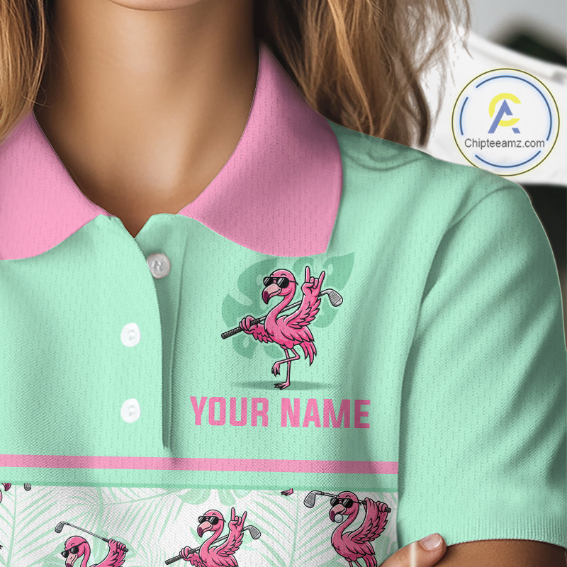 A close-up of a person wearing a mint green polo shirt with a pink collar and pink flamingo graphics, including one holding a golf club and the text 'YOUR NAME'. A circular 'Chipteamz.