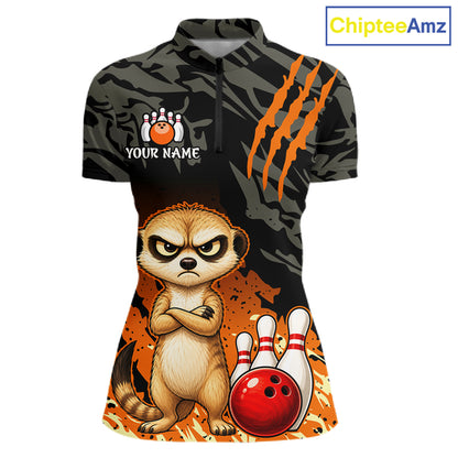 A women's short-sleeve polo shirt with a bowling-themed graphic print. The shirt features a black and dark gray camouflage pattern, orange claw marks, a cartoon meerkat, bowling pins, and a red bowling ball, with customizable text 'YOUR NAME' on the left chest.