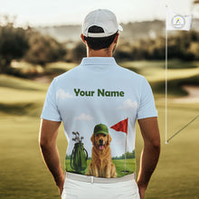 Load image into Gallery viewer, Man wearing a light blue polo shirt with a dog and golf club design on a golf course